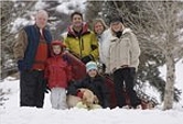 Family playing in snow